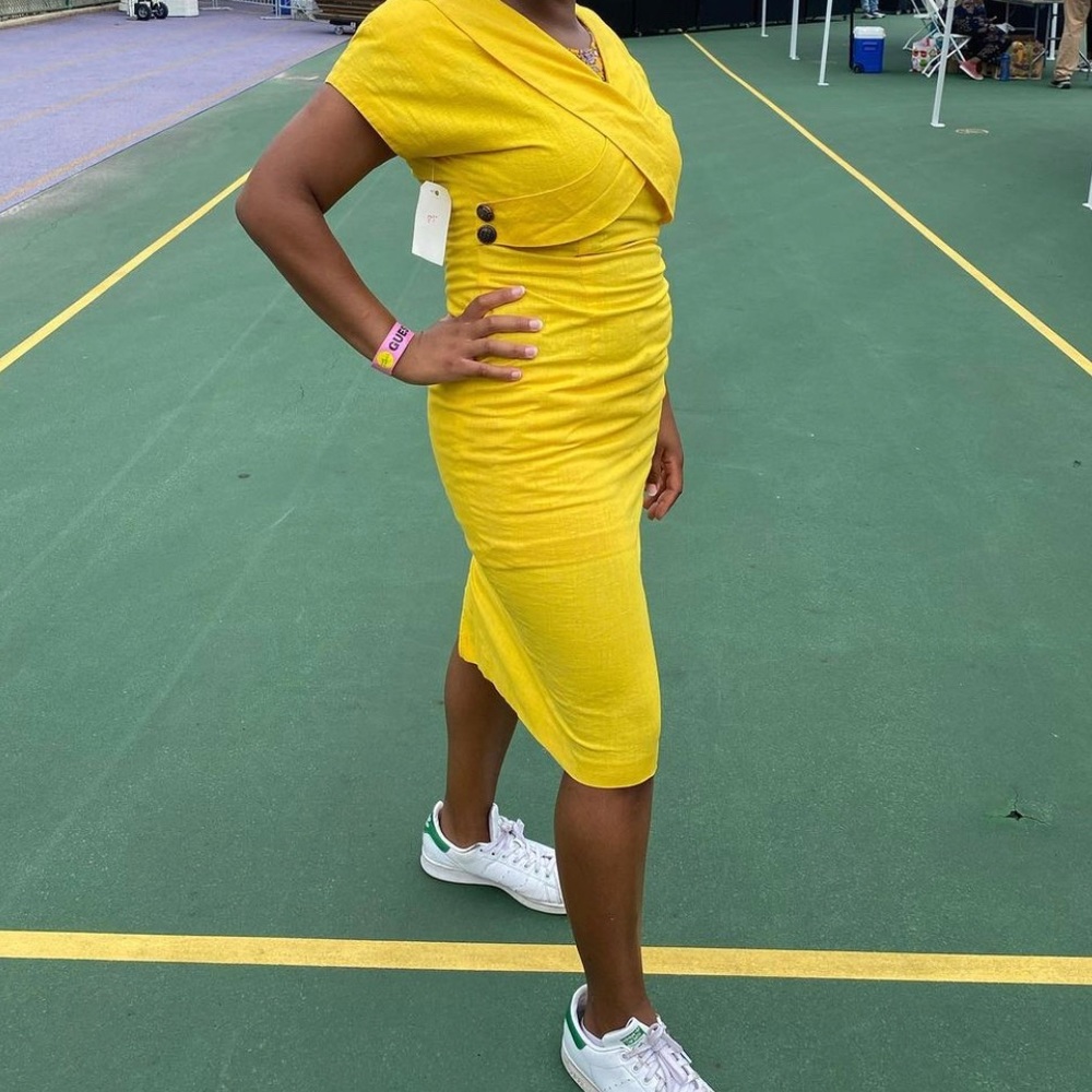 Vintage yellow dress. Never worn, too small.